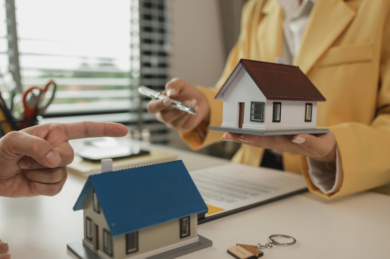A man comes to a real estate agent for consultation about the house he is buying to start his family